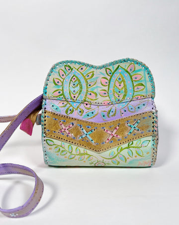Hand painted, up cycled real leather handbag in pastel colors by Mer Rose Atelier