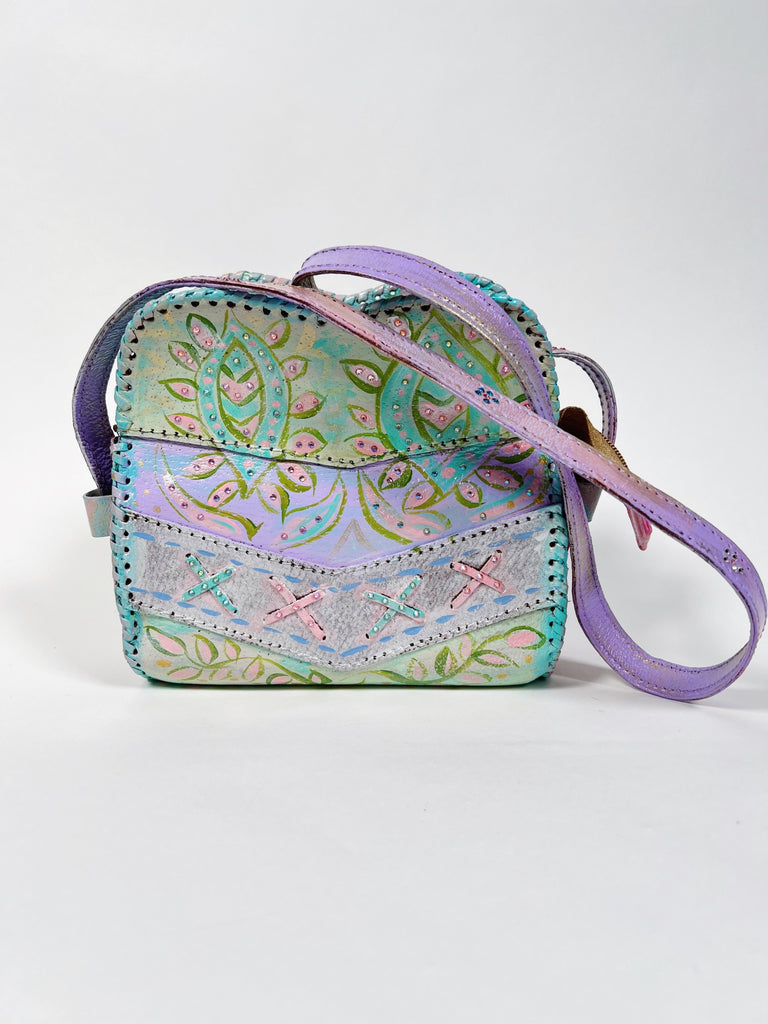 Hand painted, up cycled real leather handbag in pastel colors by Mer Rose Atelier