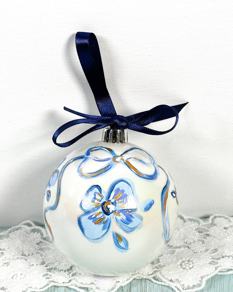Pretty hand painted, one-of-a-kind holiday Christmas ornaments available to shop on Mer Rose Atelier