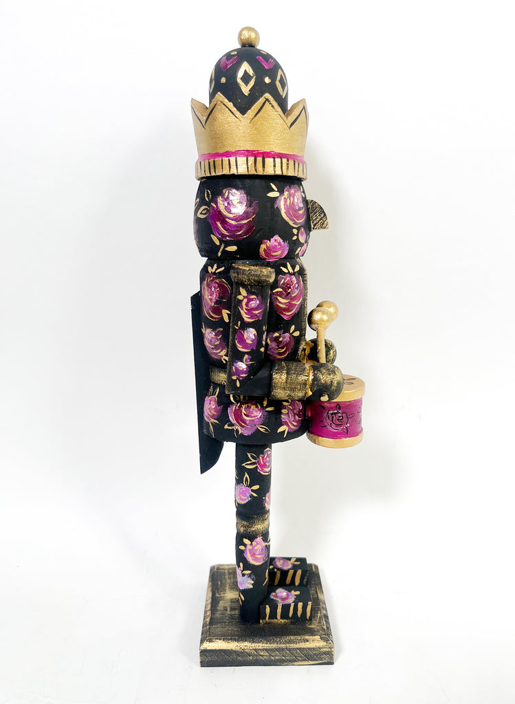 A beautiful addition to your holiday table decor or mantle. The Rose & Noir Nutcracker is a treasure for years to come!