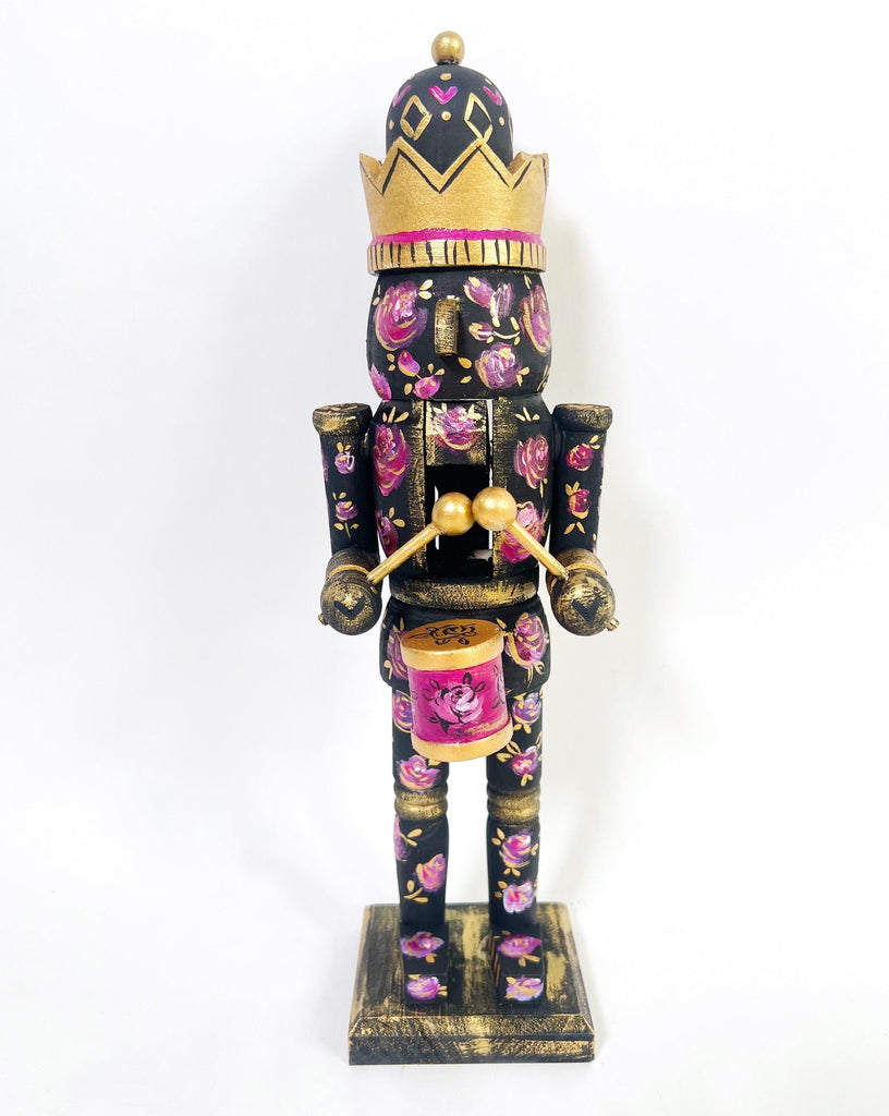 A beautiful addition to your holiday table decor or mantle. The Rose & Noir Nutcracker is a treasure for years to come!