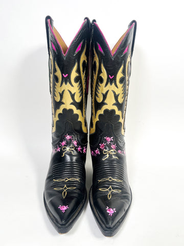 One-of-a-kind, hand painted Mer Rose Atelier cowboy boots are the ultimate fashion statement. 