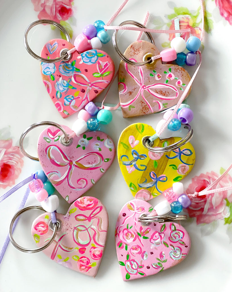 Hand painted, one-of-a-kind heart keychains by Mer Rose Atelier 