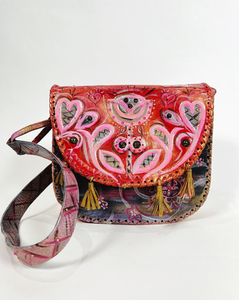 Pretty Stella is a hand painted, up cycled, one of a kind, luxury  leather handbag