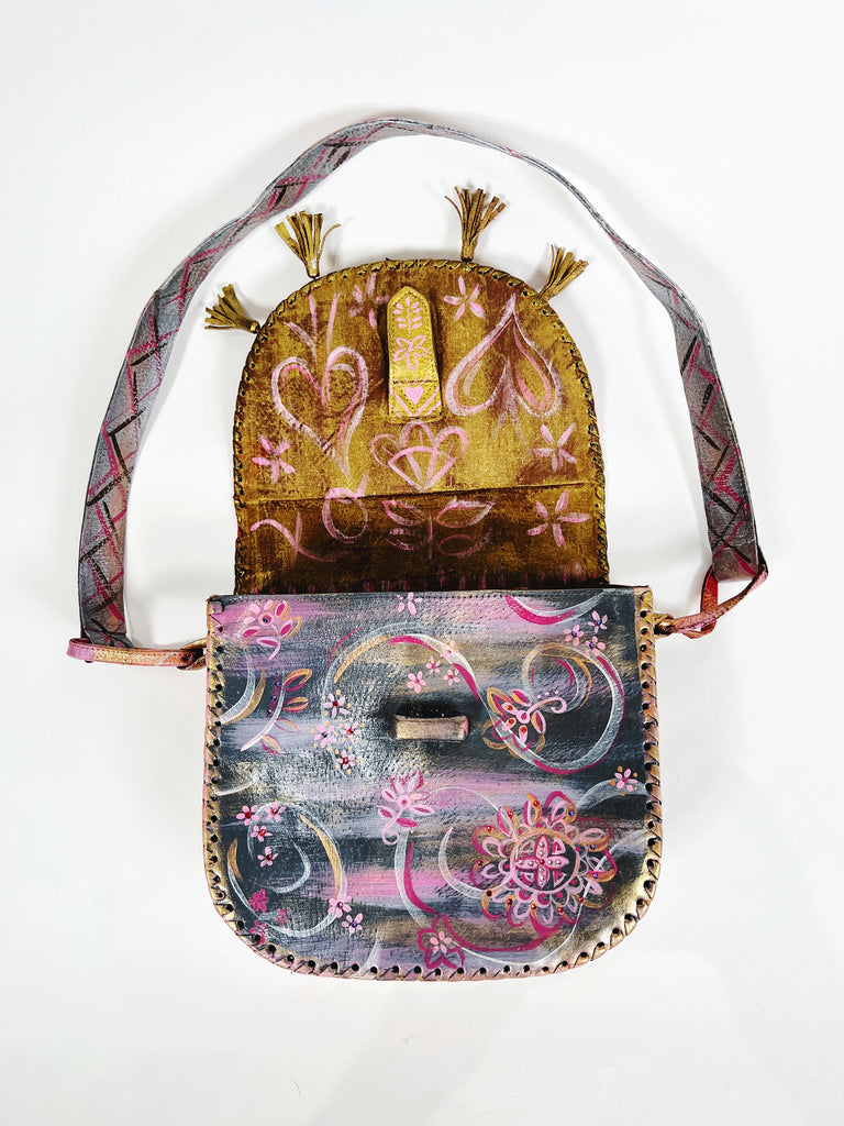 Pretty Stella is a hand painted, up cycled, one of a kind, luxury  leather handbag